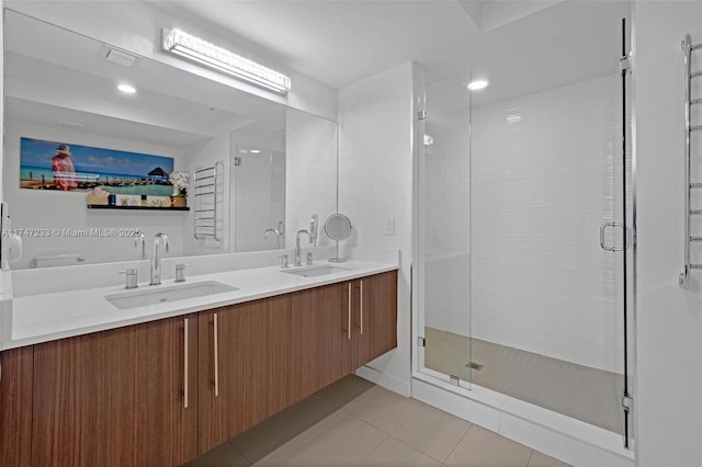 7825 NW 107th Ave Unit 618, Doral, FL 33178 - bathroom featuring tile patterned floors, vanity, and walk in shower