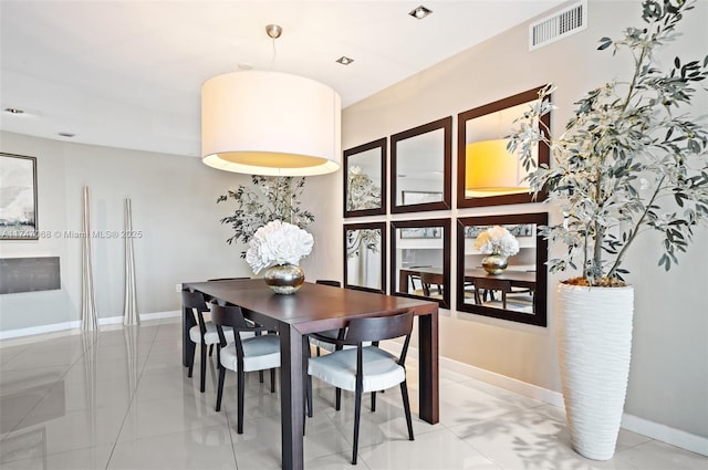 9601 Collins Ave Unit 1208, Bal Harbour, FL 33154 - dining room with baseboards and light tile patterned flooring