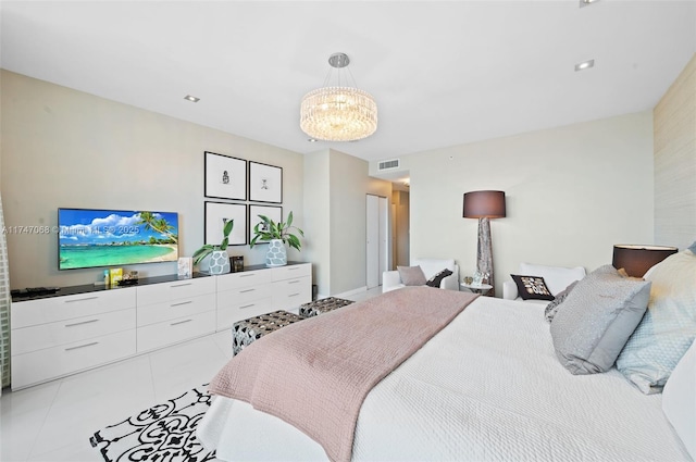 tiled bedroom with an inviting chandelier