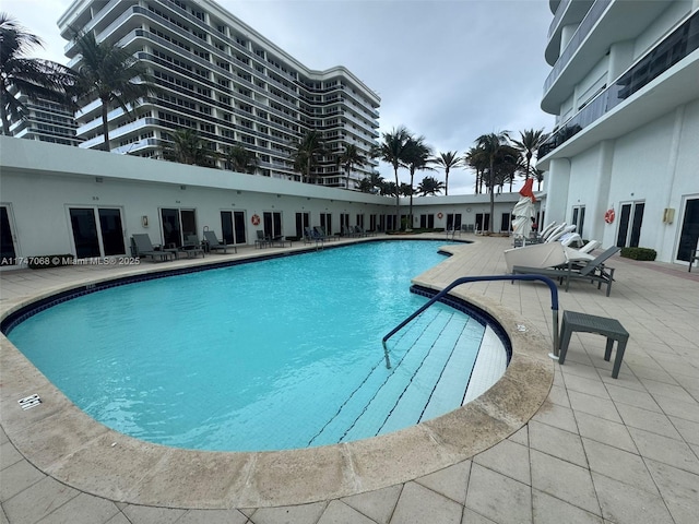 9601 Collins Ave Unit 1208, Bal Harbour, FL 33154 - community pool featuring a patio area