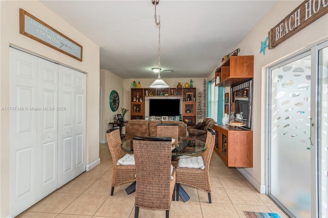 dining room featuring light tile patterned floors