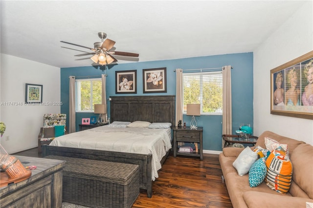 bedroom featuring baseboards, a ceiling fan, and wood finished floors