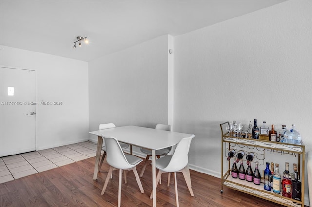 dining room with light hardwood / wood-style flooring