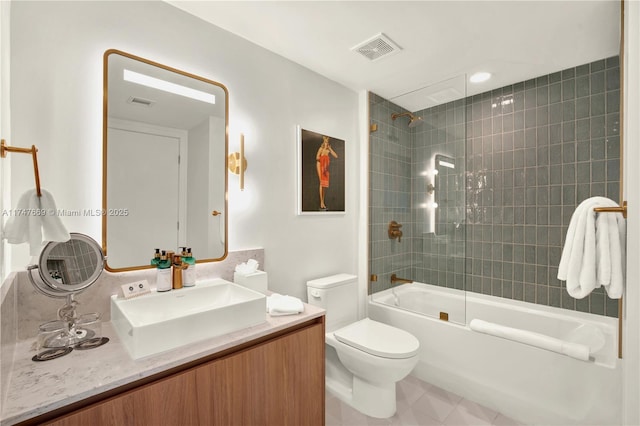 full bath featuring vanity,  shower combination, toilet, and visible vents