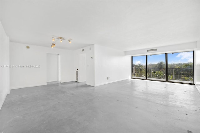 empty room featuring concrete floors