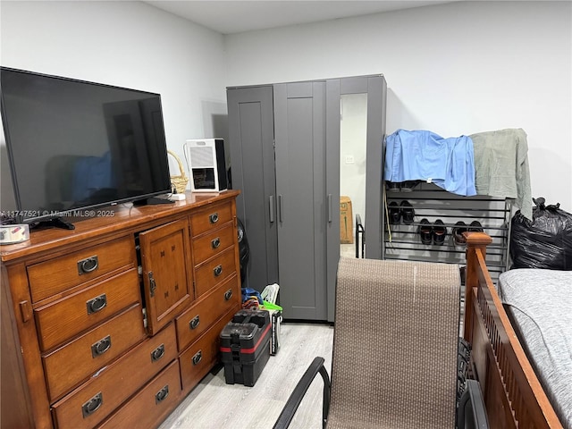 bedroom with light hardwood / wood-style floors