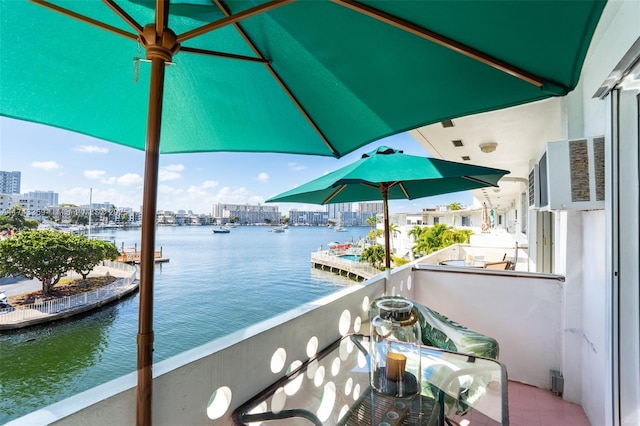 balcony with a city view and a water view