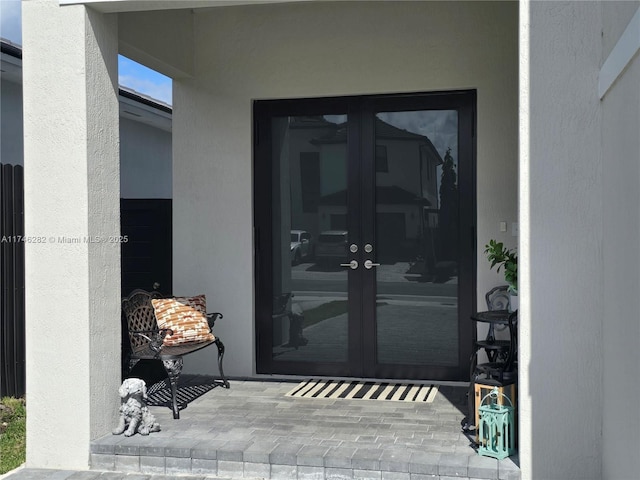 property entrance with french doors