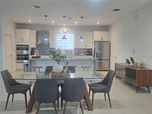 view of tiled dining space