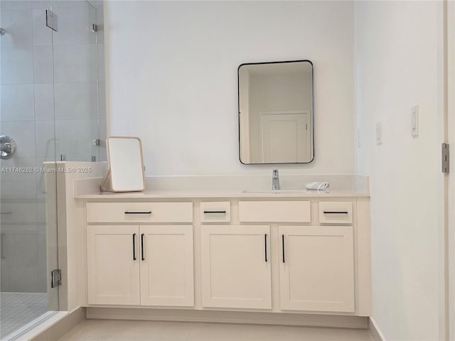bathroom with vanity and walk in shower