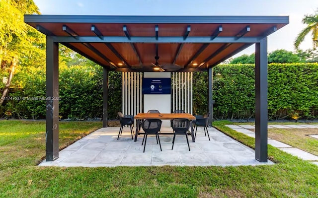 view of patio with ceiling fan