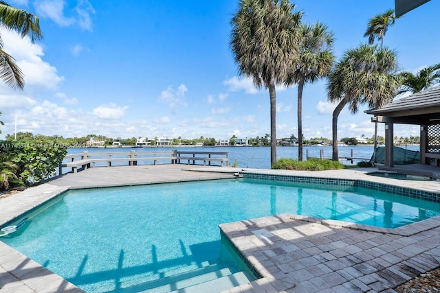 outdoor pool with a water view