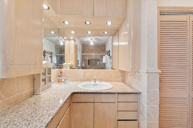 full bathroom featuring a closet, a shower stall, vanity, and recessed lighting