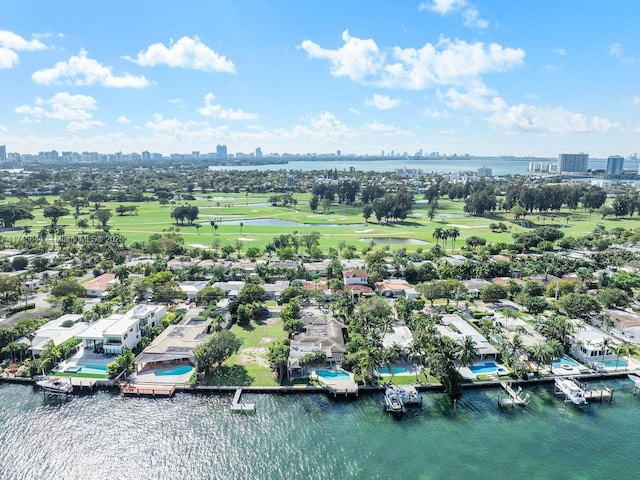 drone / aerial view with a view of city and a water view