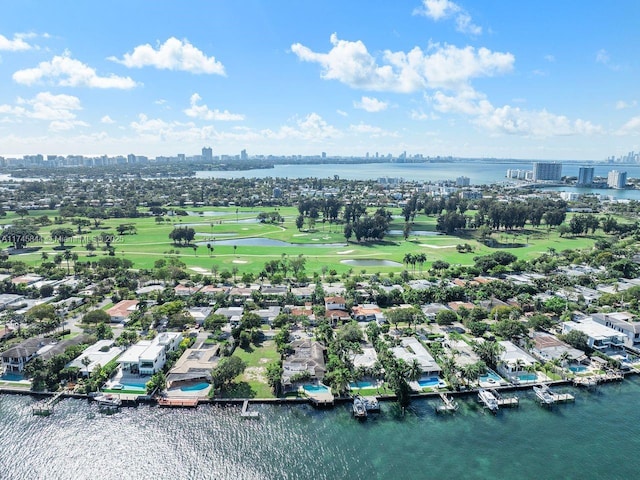 bird's eye view featuring a water view and a city view