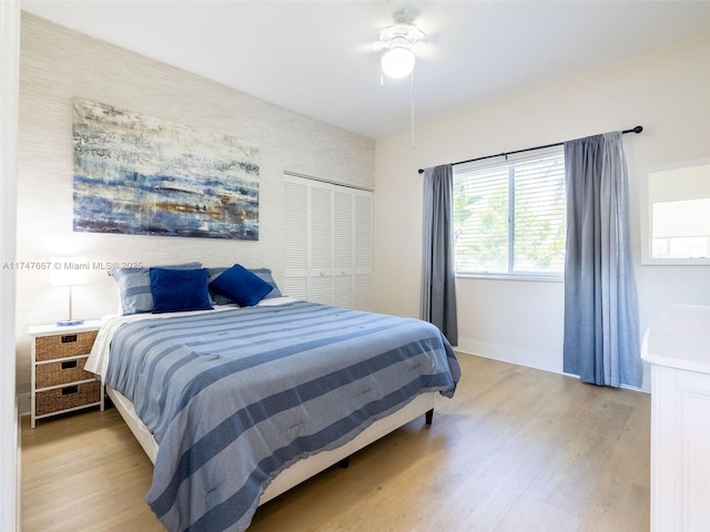 bedroom featuring ceiling fan and light hardwood / wood-style floors