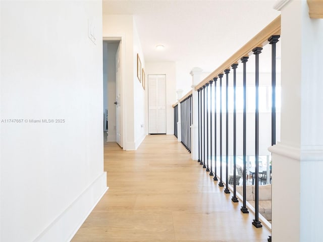 hallway featuring light wood-type flooring