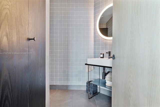 bathroom featuring tile walls and tile patterned flooring