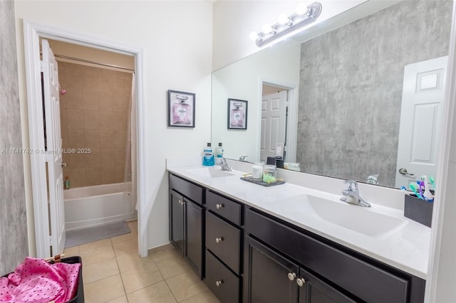 full bathroom featuring double vanity, shower / washtub combination, a sink, and tile patterned floors