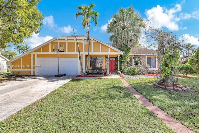 view of front of house with a front lawn and a garage