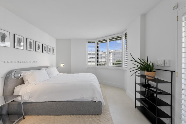 bedroom with baseboards