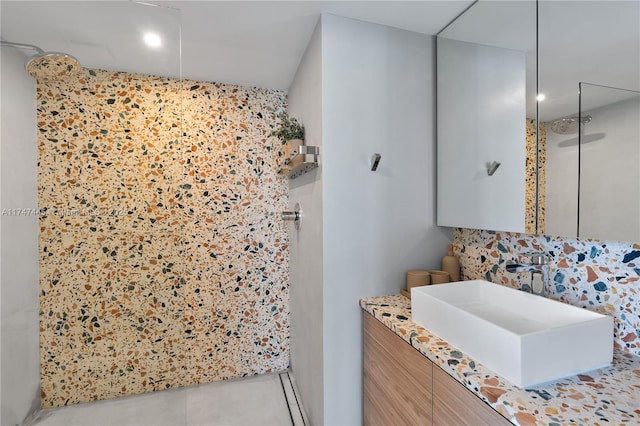 bathroom with vanity, a shower stall, and tile patterned flooring