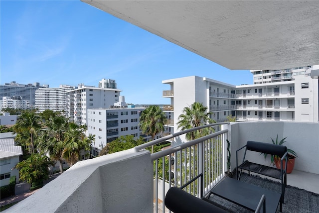 balcony featuring a city view