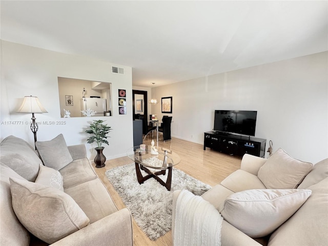 living room featuring light wood-type flooring