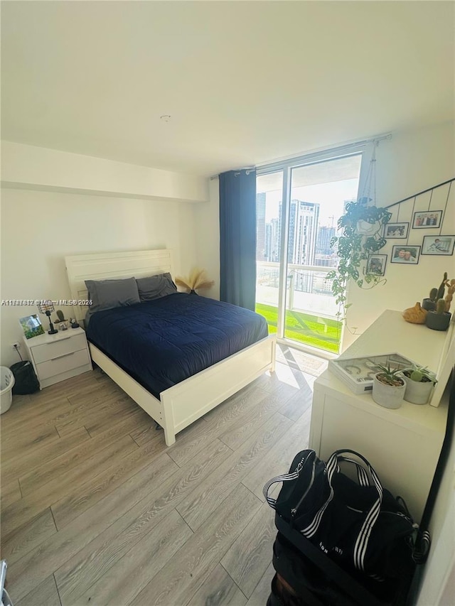 50 Biscayne Blvd Unit 3505, Miami, FL 33132 - bedroom featuring light wood-style flooring