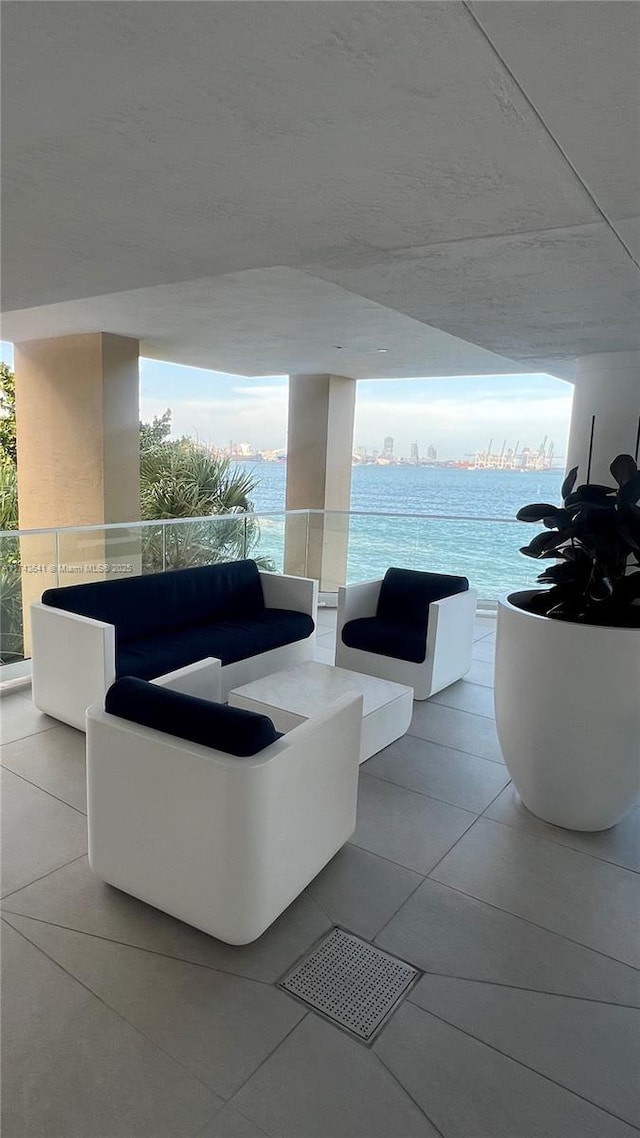 view of patio / terrace with an outdoor living space and a balcony
