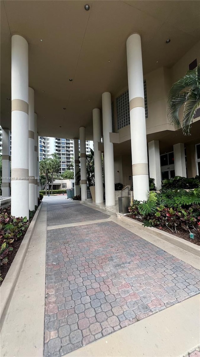 entrance to property with stucco siding