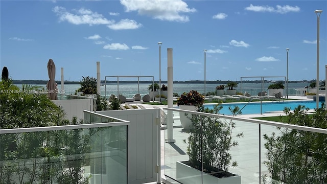 exterior space with a water view