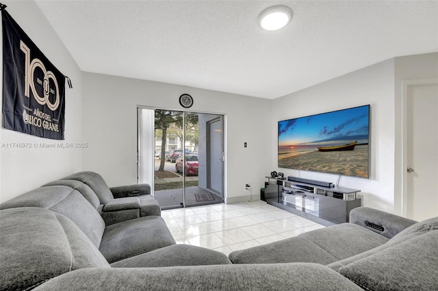 tiled living room with a textured ceiling