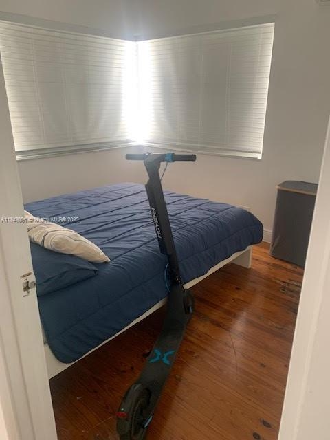 830 10th St Unit 1, Miami Beach, FL 33139 - bedroom with dark hardwood / wood-style flooring