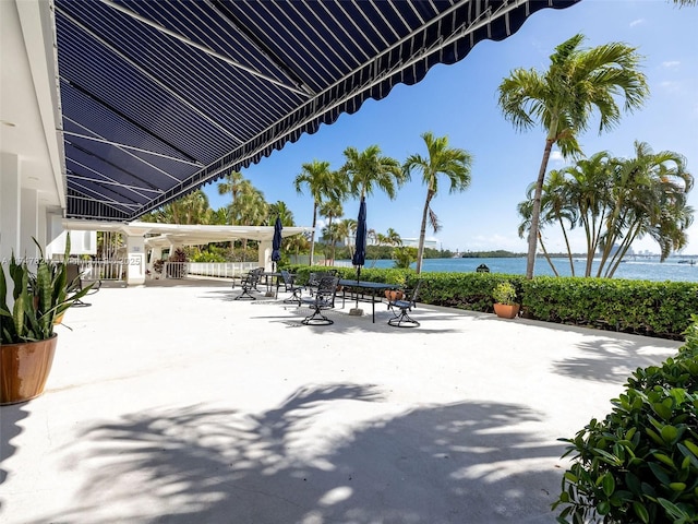 view of patio / terrace featuring a water view