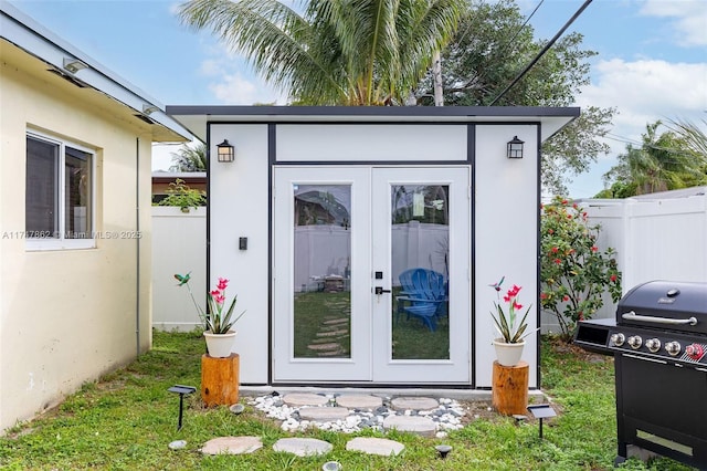 view of outbuilding with french doors