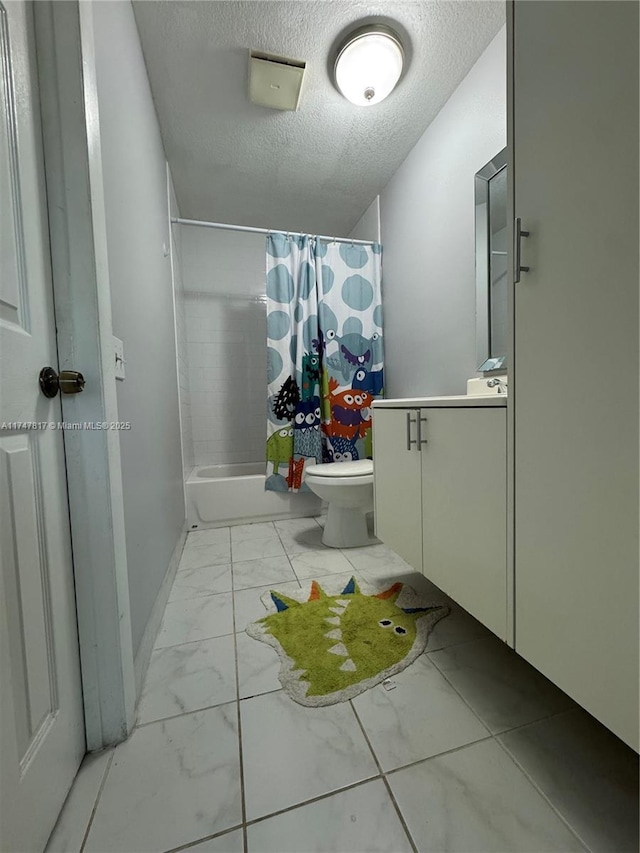 full bathroom with toilet, vanity, shower / tub combo with curtain, and a textured ceiling