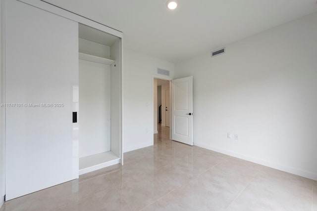unfurnished bedroom featuring recessed lighting, visible vents, and baseboards