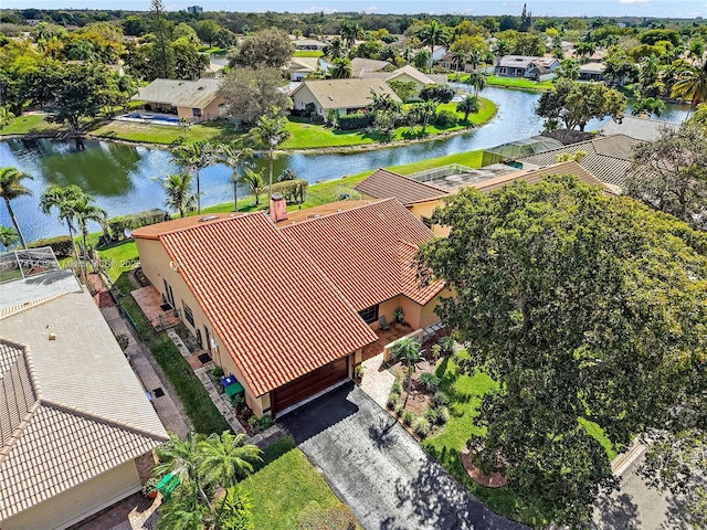 bird's eye view with a water view