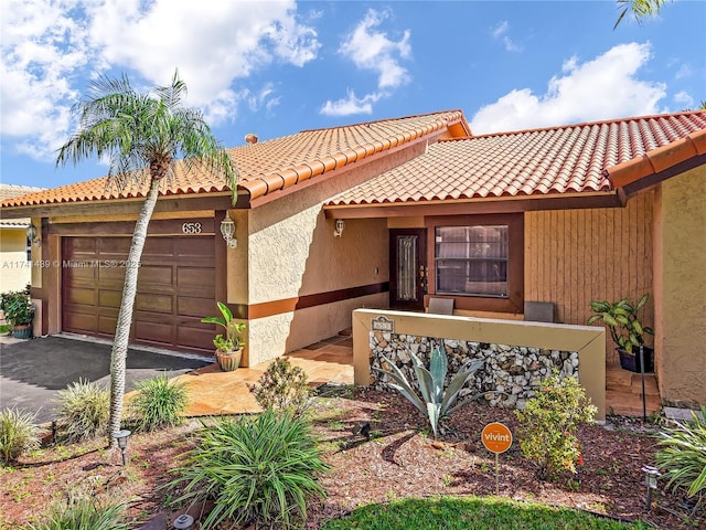 653 NW 110th Ave, Coral Springs, FL 33071 - mediterranean / spanish-style house with a garage