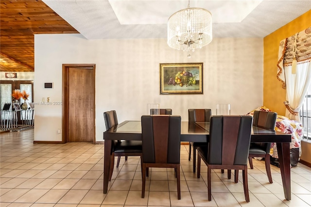 653 NW 110th Ave, Coral Springs, FL 33071 - dining area featuring light tile patterned floors and a notable chandelier