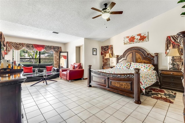 653 NW 110th Ave, Coral Springs, FL 33071 - tiled bedroom with ceiling fan, vaulted ceiling, and a textured ceiling