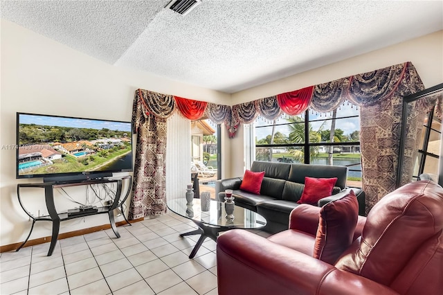 653 NW 110th Ave, Coral Springs, FL 33071 - living room with light tile patterned floors and a textured ceiling