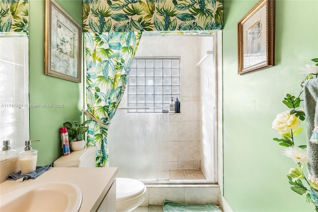 653 NW 110th Ave, Coral Springs, FL 33071 - bathroom with vanity, tiled shower, and toilet
