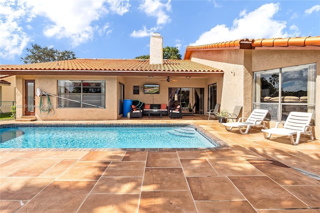 653 NW 110th Ave, Coral Springs, FL 33071 - back of house featuring a patio and ceiling fan