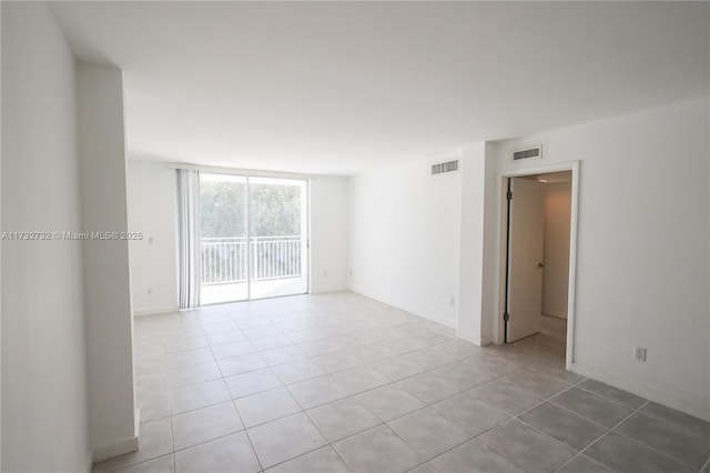 view of tiled spare room