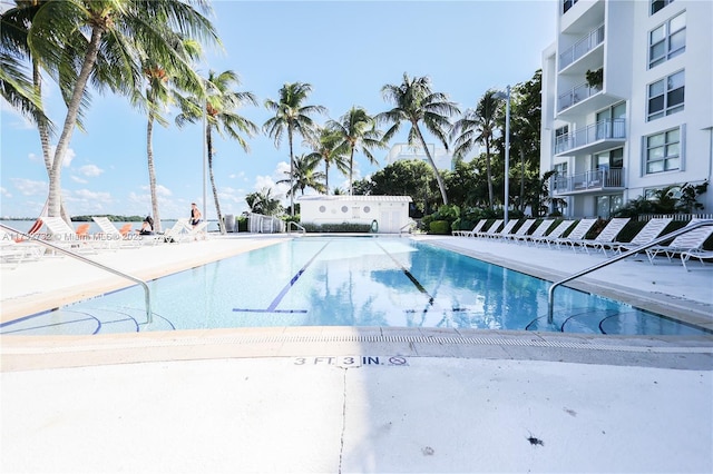 view of swimming pool with a patio