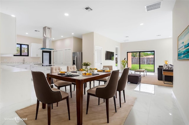 dining space with sink