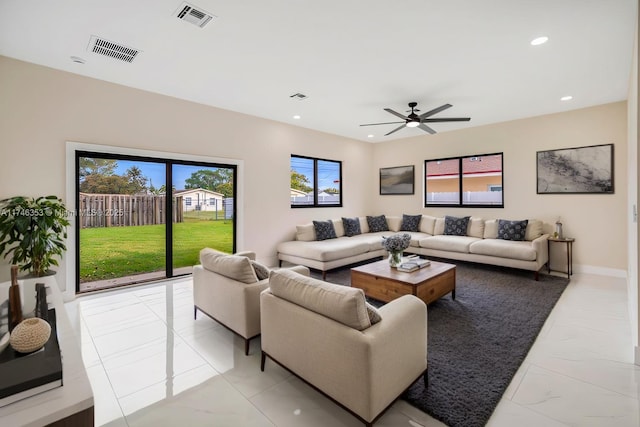 living room featuring ceiling fan