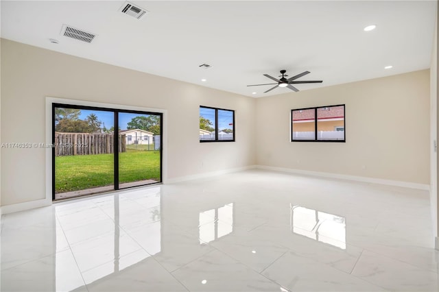 empty room featuring ceiling fan